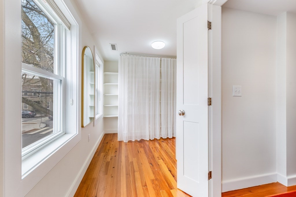 73 Gore Street Cambridge, MA 02141 - Photo 25 of 41 a view of a bathroom with a tub and shower