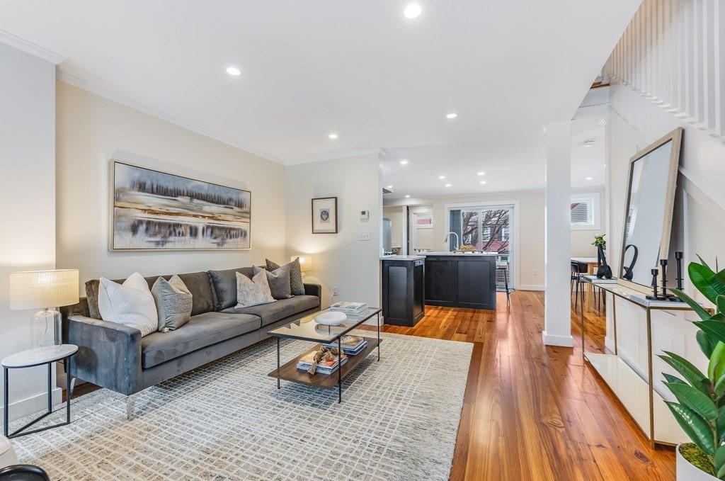 73 Gore Street Cambridge, MA 02141 - Photo 8 of 41 a living room with furniture and a flat screen tv