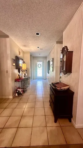 a room with gym equipment and a table