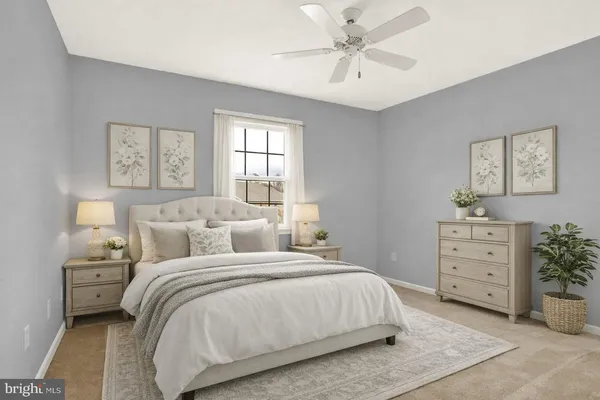 a bedroom with a bed and a dresser