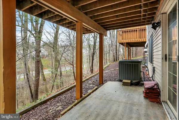 a view of hallway with seating area