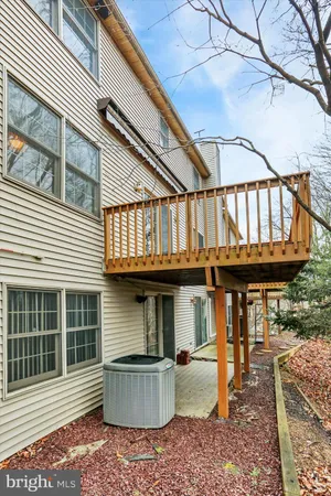 a front view of a house with barbeque oven