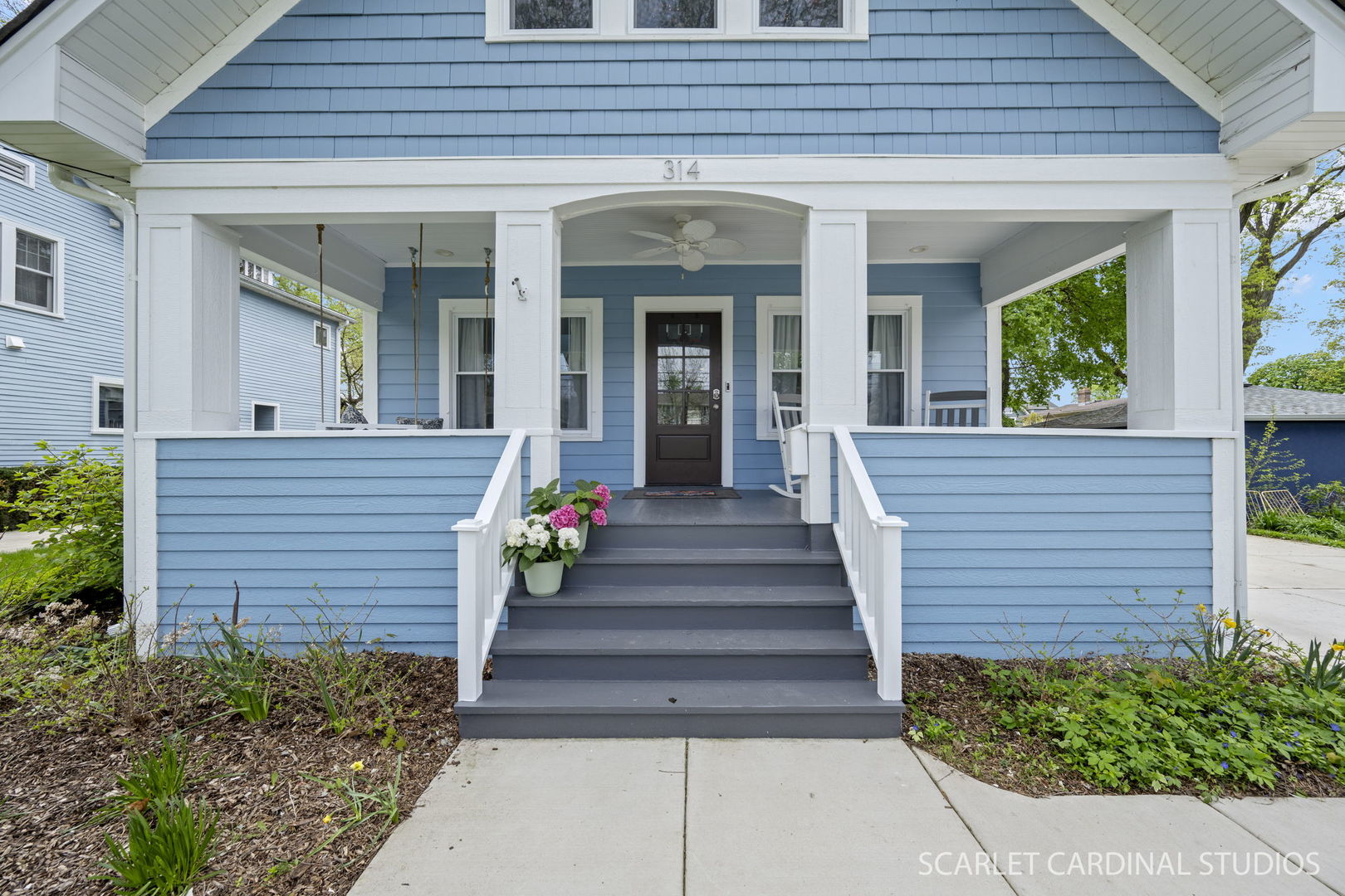 314 East Jefferson Avenue Wheaton, IL 60187 - Photo 2 of 41 a view of a house with potted plants