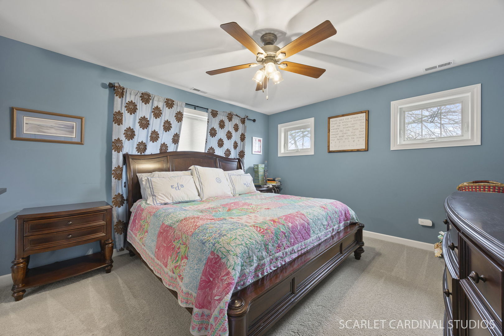 314 East Jefferson Avenue Wheaton, IL 60187 - Photo 23 of 41 a bedroom with a bed and a chandelier