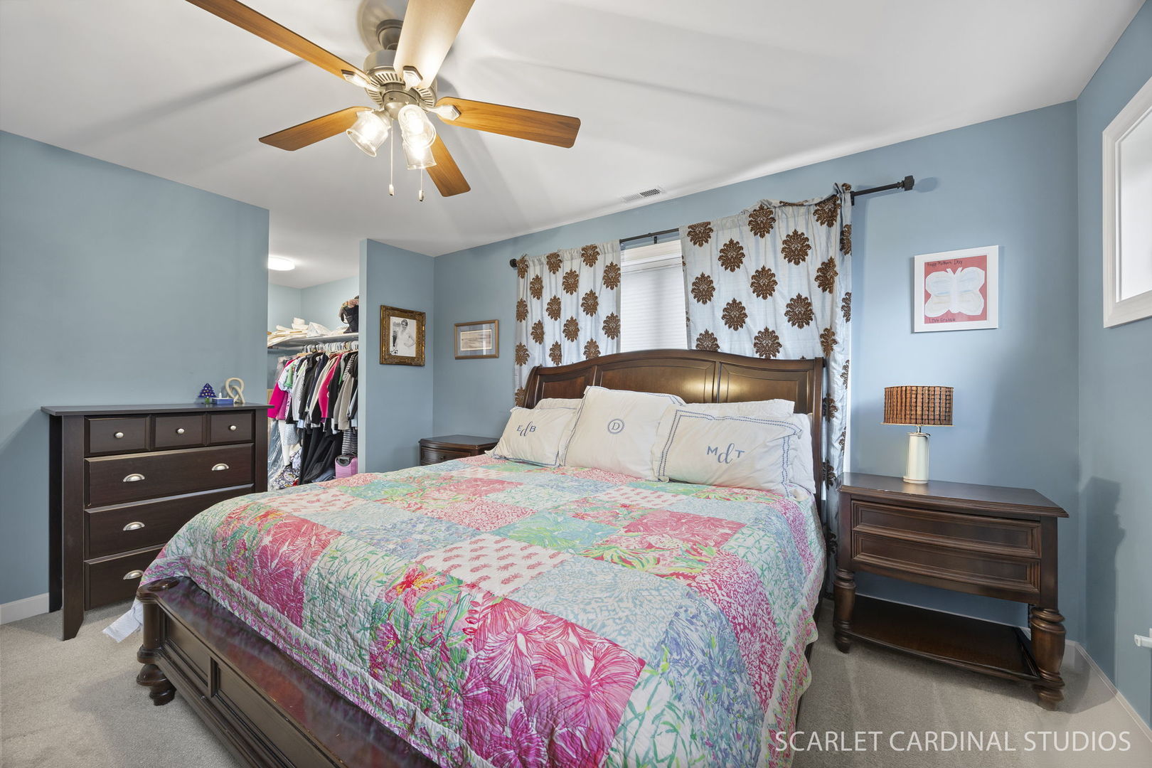 314 East Jefferson Avenue Wheaton, IL 60187 - Photo 24 of 41 a bedroom with a bed and a chandelier