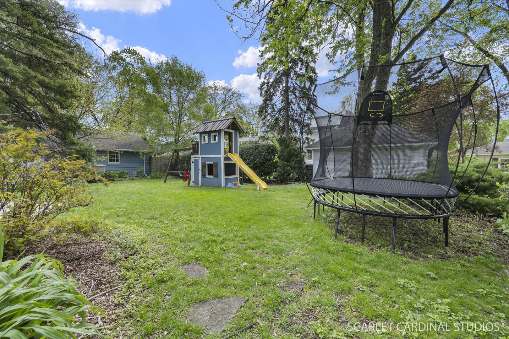 314 East Jefferson Avenue Wheaton, IL 60187 - Photo 37 of 41 a view of a house with backyard and a sitting area