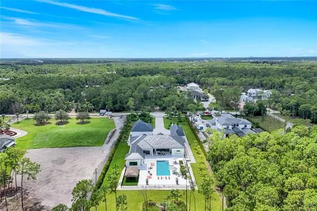 an aerial view of a house with a garden