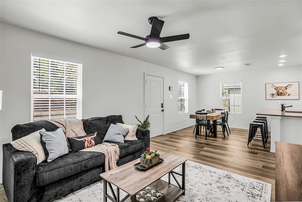 308 South 3rd Street Bonham, TX 75418 - Photo 8 of 19 a living room with furniture and a large window