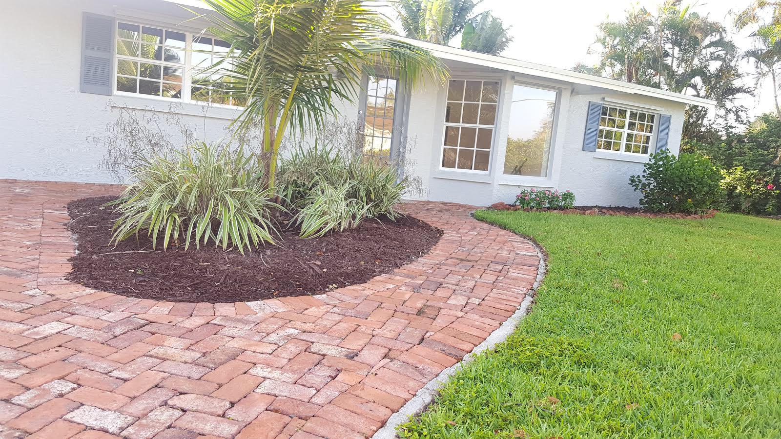 1150 Southwest 4th Avenue Boca Raton, FL 33432 - Photo 2 of 14 a view of a house with a yard