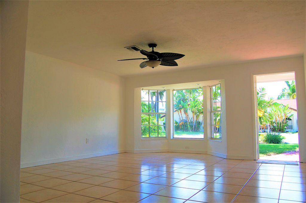 1150 Southwest 4th Avenue Boca Raton, FL 33432 - Photo 5 of 14 a view of an empty room with a window