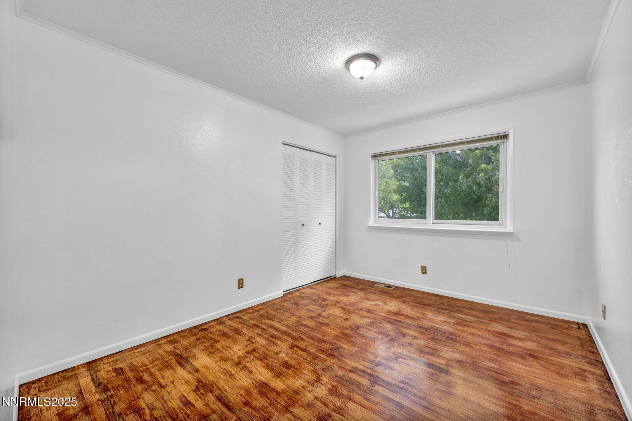 3570 West 7th Street Reno, NV 89503 - Photo 12 of 45 a view of an empty room with a window