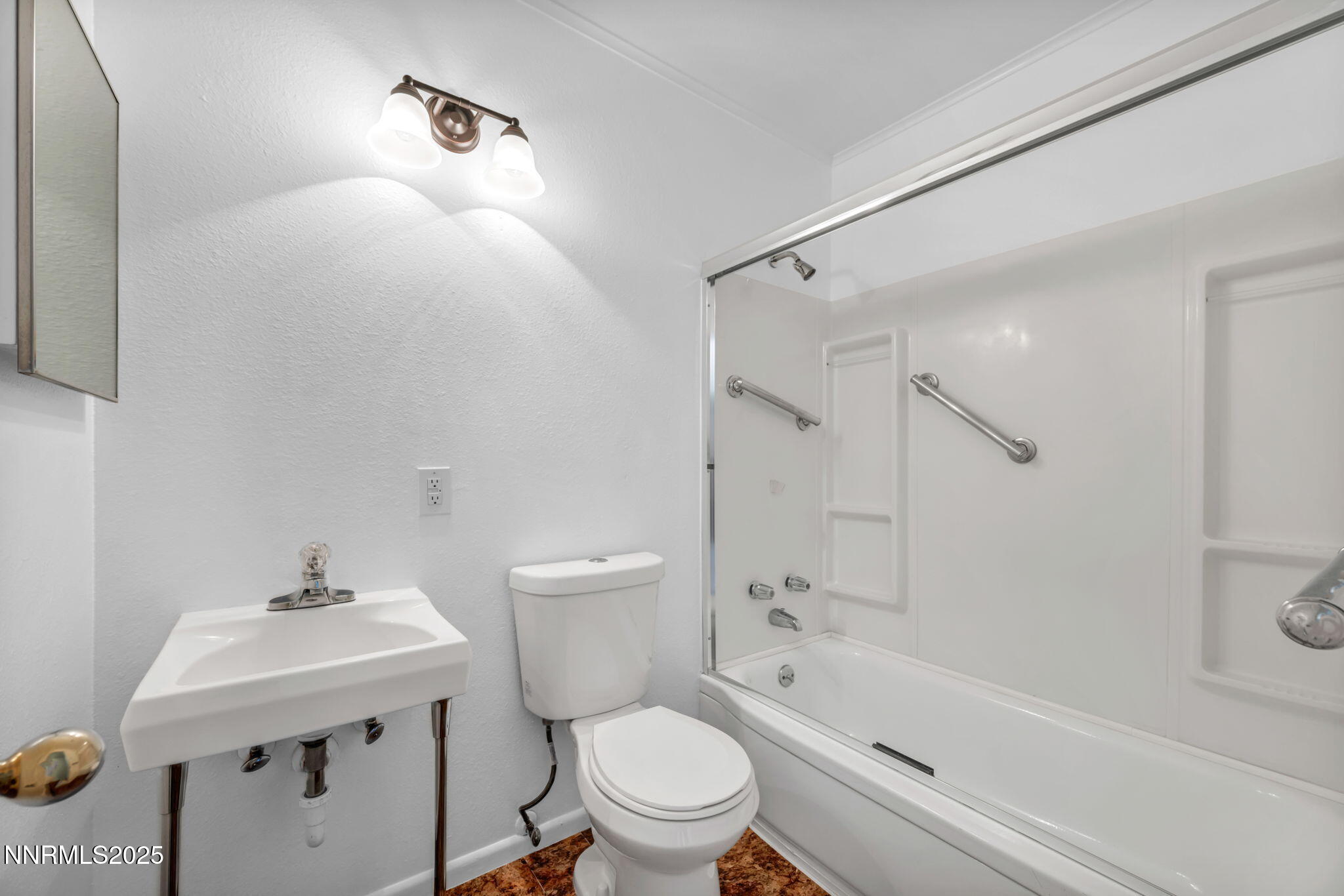 3570 West 7th Street Reno, NV 89503 - Photo 14 of 45 a bathroom with a sink a toilet and shower