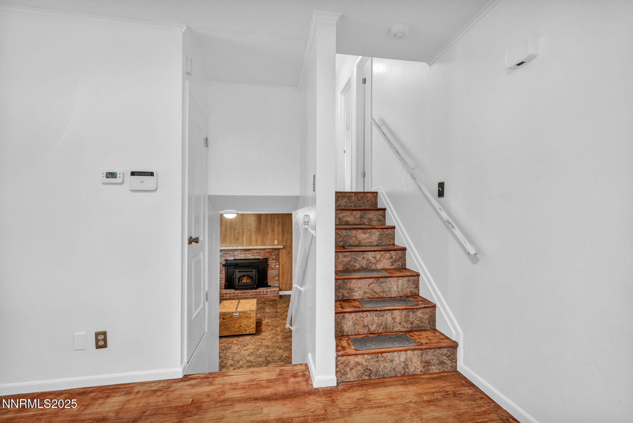 3570 West 7th Street Reno, NV 89503 - Photo 22 of 45 a view of a hallway with wooden floor and entryway