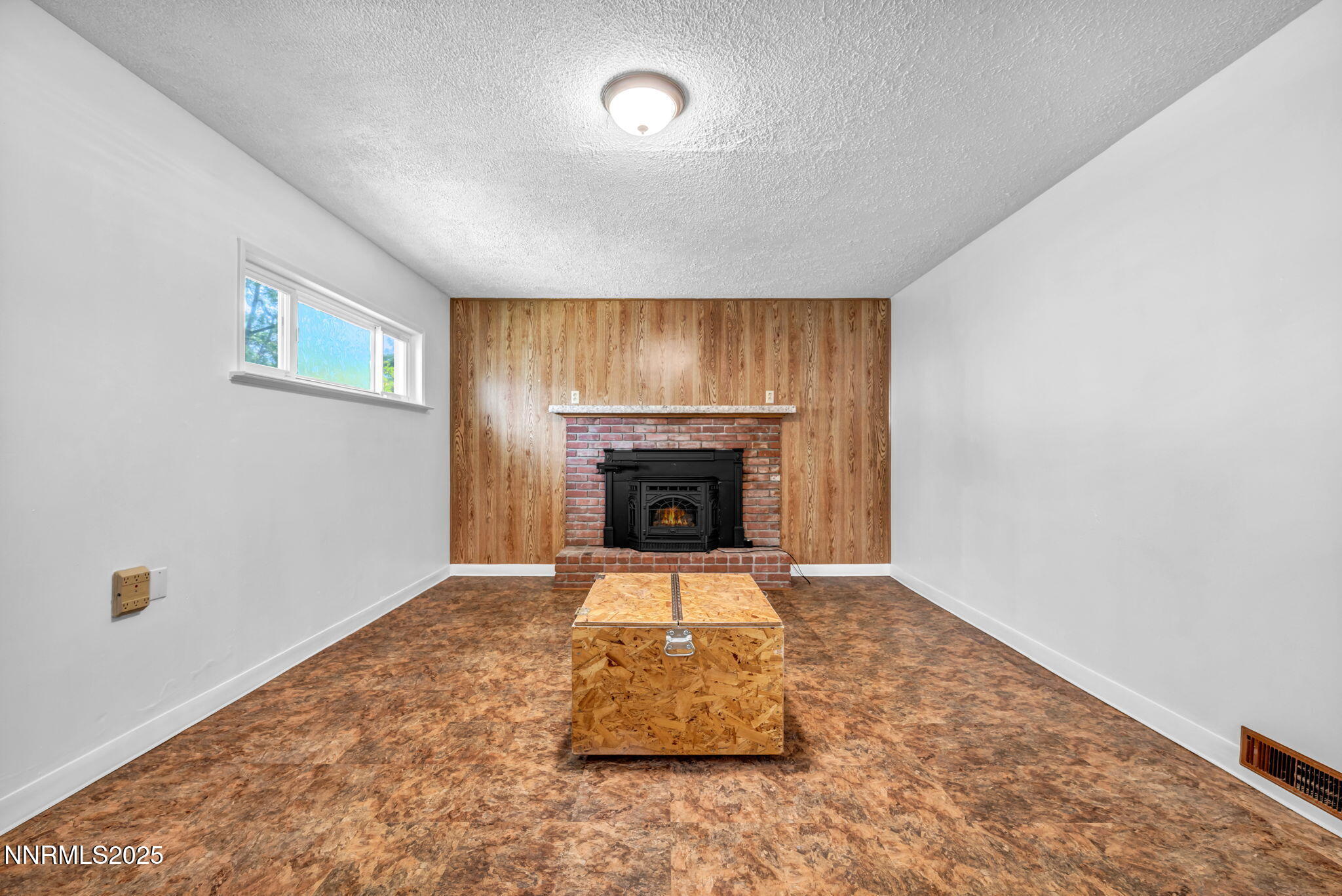 3570 West 7th Street Reno, NV 89503 - Photo 23 of 45 an empty room with fireplace