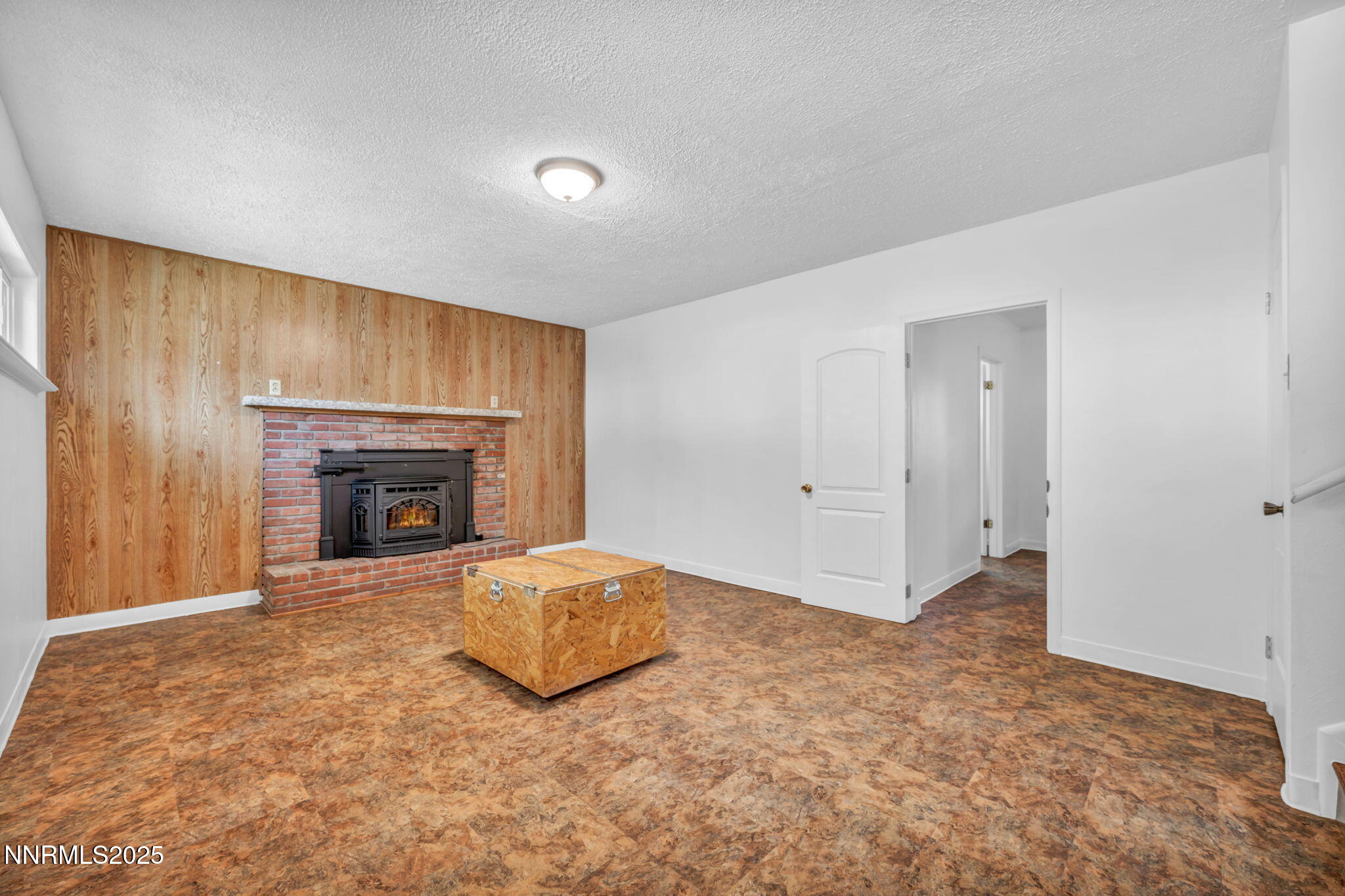 3570 West 7th Street Reno, NV 89503 - Photo 25 of 45 a view of an empty room with a fireplace