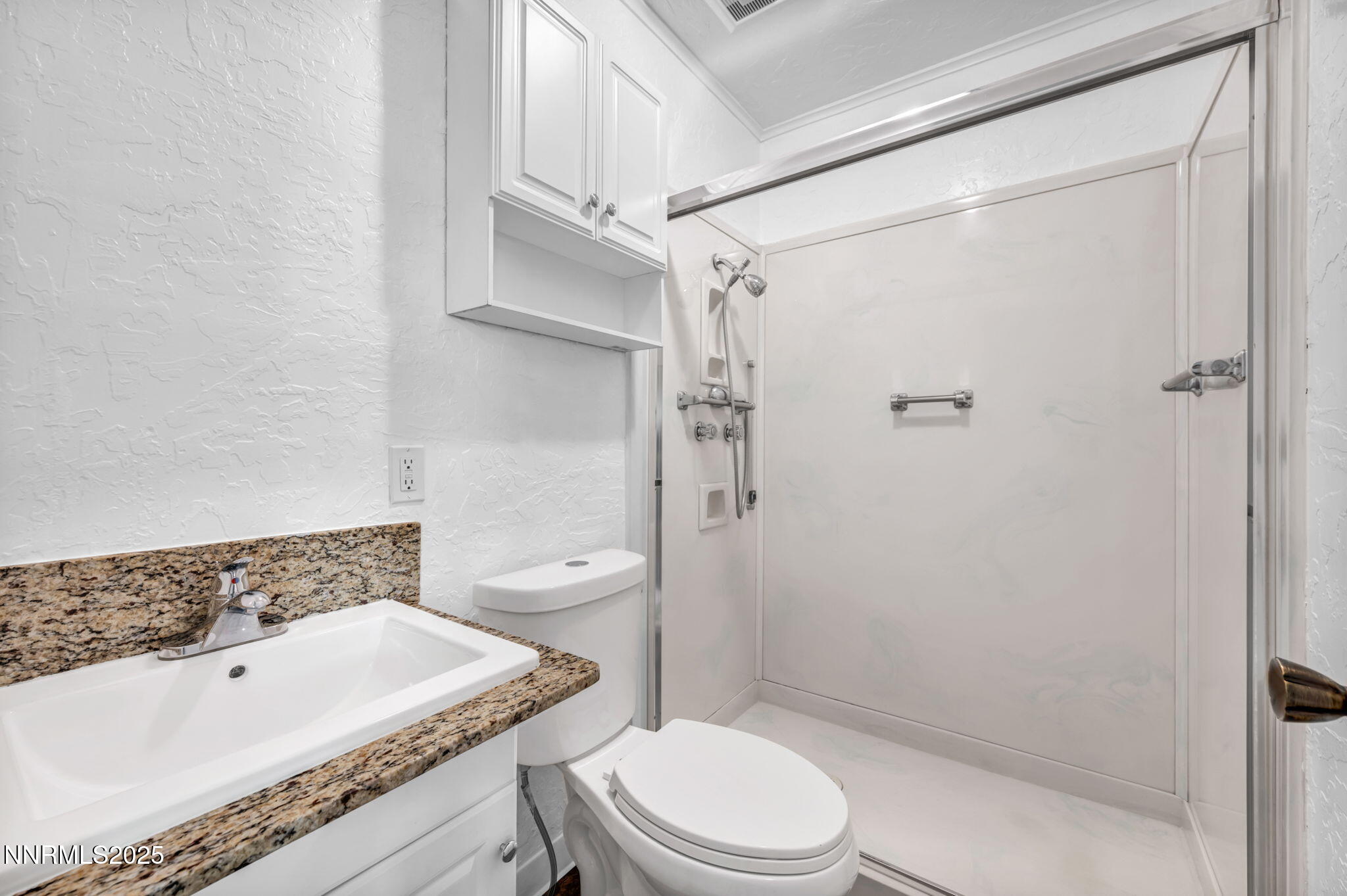 3570 West 7th Street Reno, NV 89503 - Photo 29 of 45 a bathroom with a sink a toilet and shower