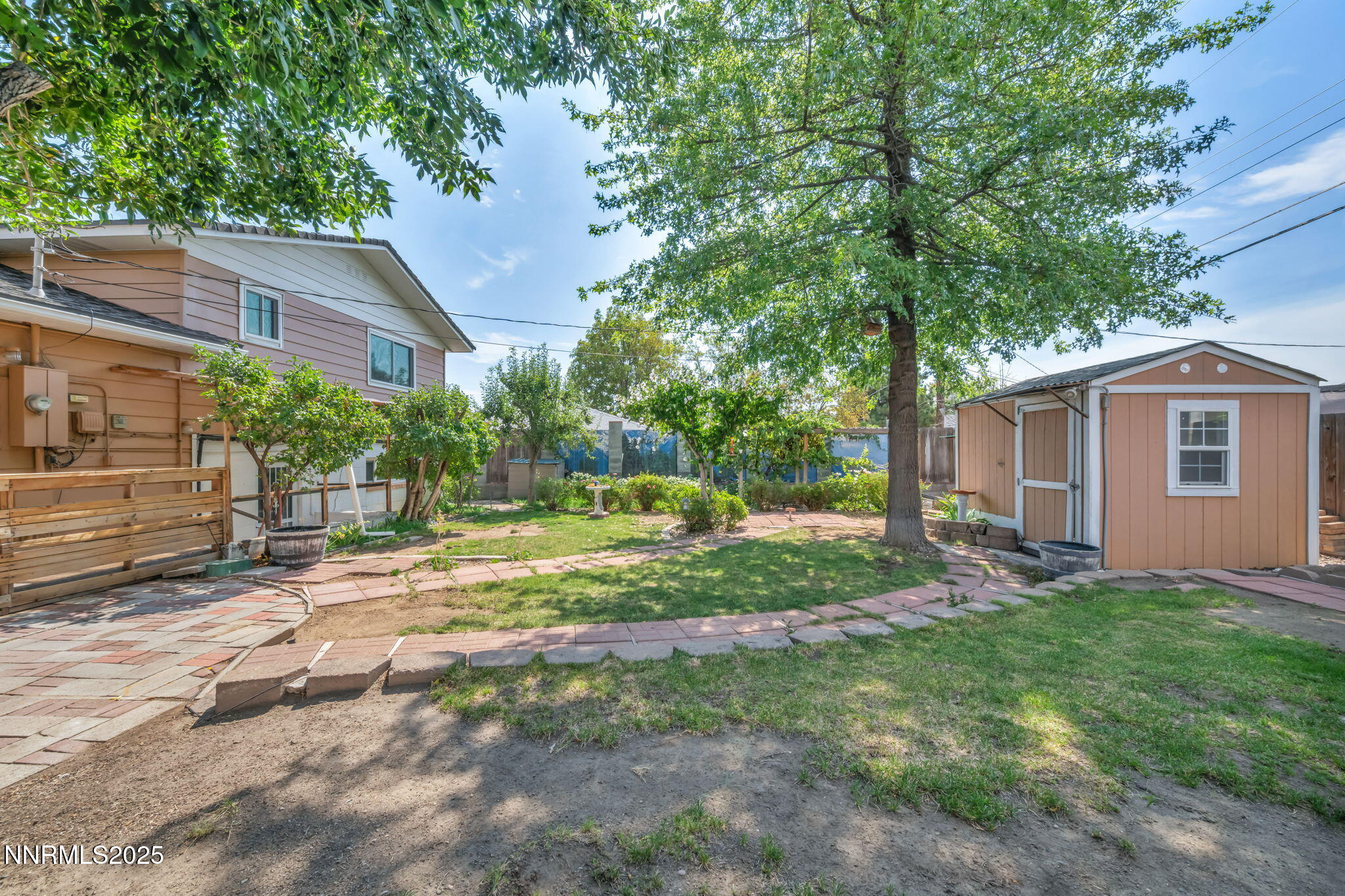 3570 West 7th Street Reno, NV 89503 - Photo 40 of 45 a view of a house with backyard and a tree