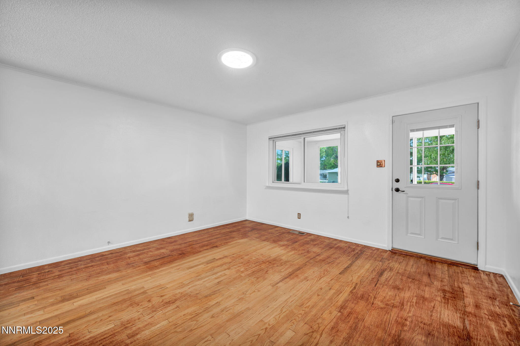 3570 West 7th Street Reno, NV 89503 - Photo 9 of 45 a view of empty room with wooden floor