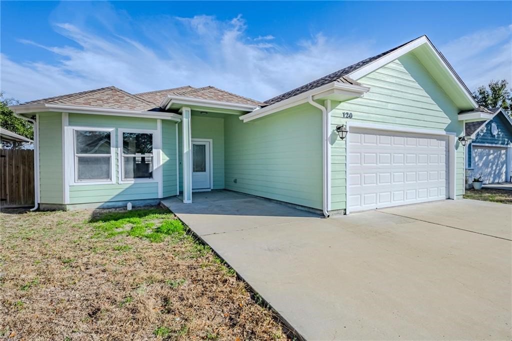 120 Sandollar Circle Fulton, TX 78382 - Photo 1 of 39 a front view of a house with a yard
