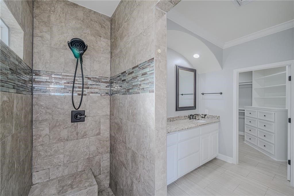 120 Sandollar Circle Fulton, TX 78382 - Photo 24 of 39 a bathroom with a shower and a sink