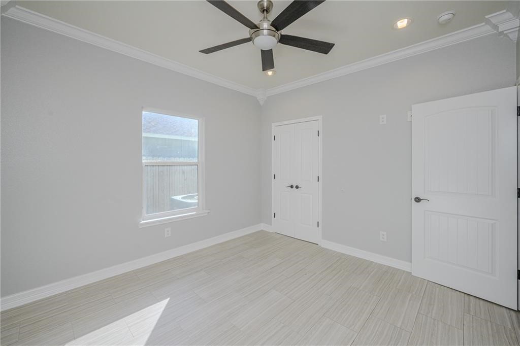 120 Sandollar Circle Fulton, TX 78382 - Photo 29 of 39 wooden floor in an empty room with a window