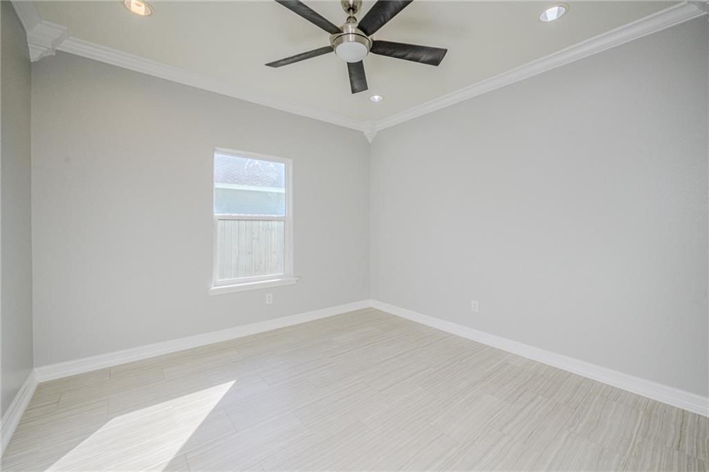 120 Sandollar Circle Fulton, TX 78382 - Photo 31 of 39 an empty room with a window and a fan