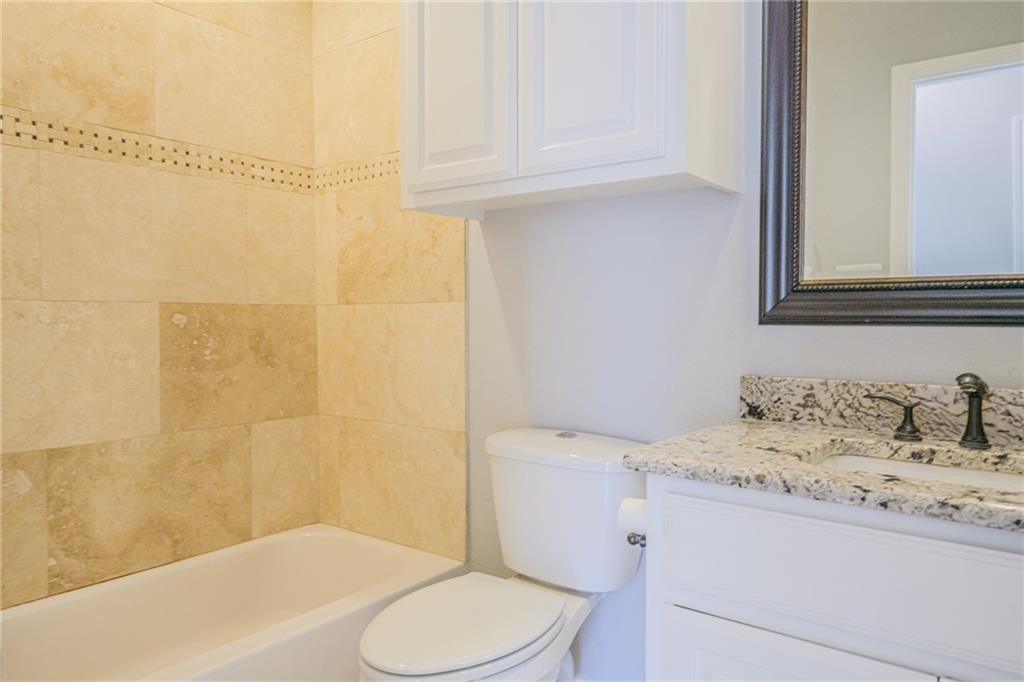 120 Sandollar Circle Fulton, TX 78382 - Photo 34 of 39 a bathroom with a sink a toilet and shower