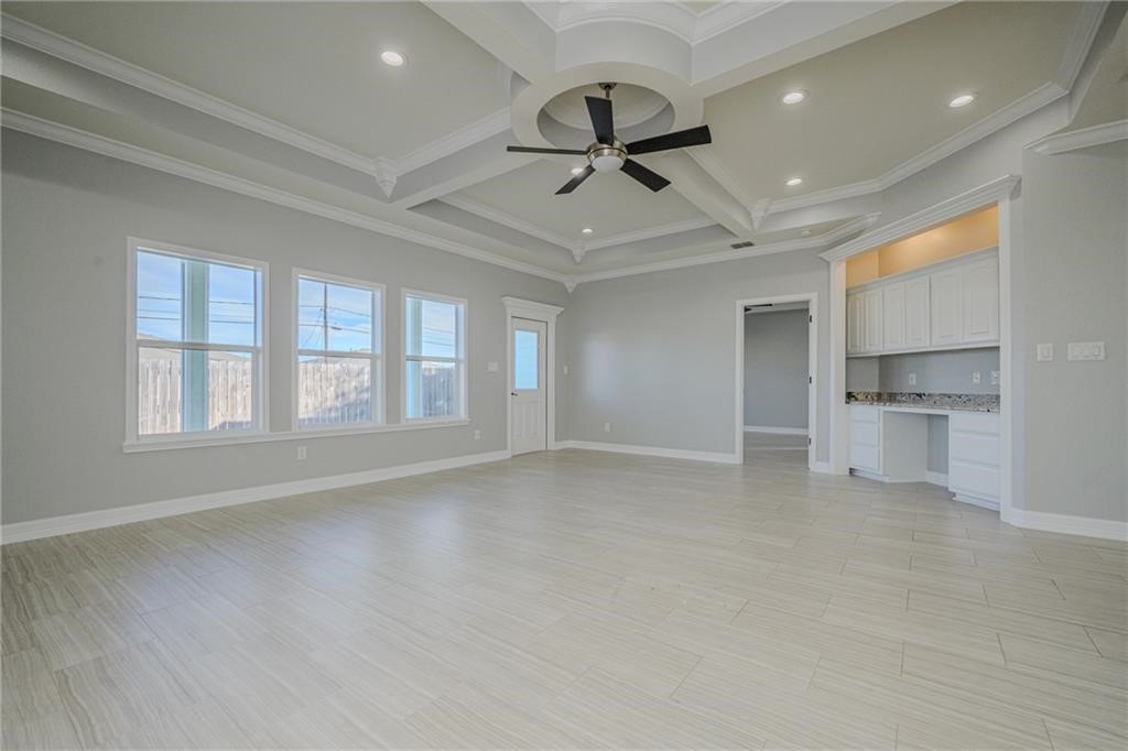 120 Sandollar Circle Fulton, TX 78382 - Photo 5 of 39 a view of empty room with wooden floor and window