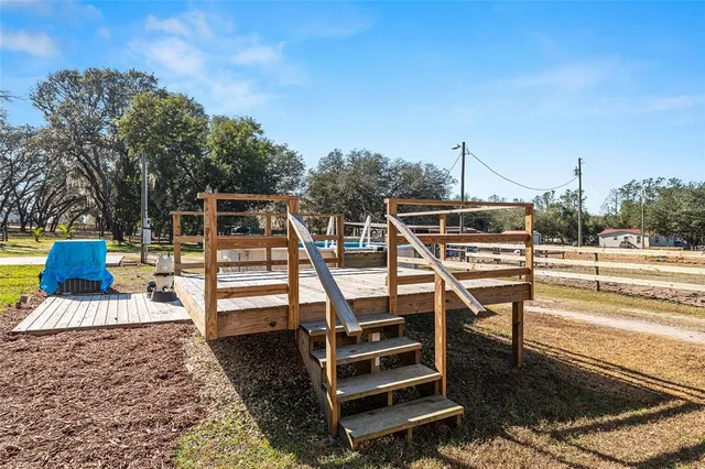 a view of a swimming pool with a lake view