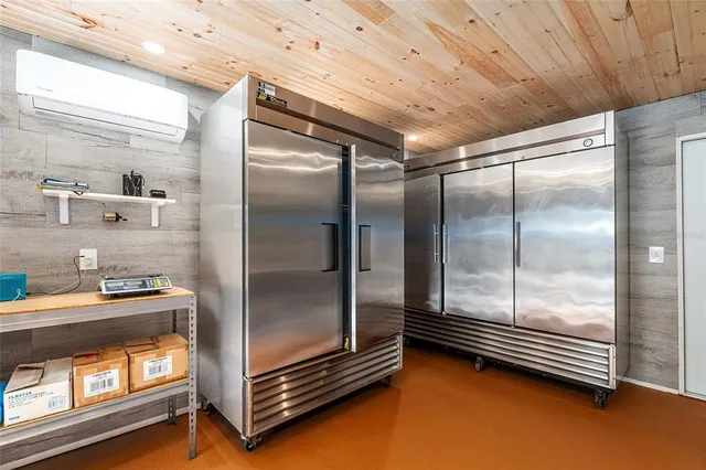 a kitchen with stainless steel appliances granite countertop a sink counter space and cabinets