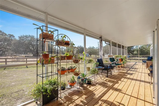 a living room with large windows