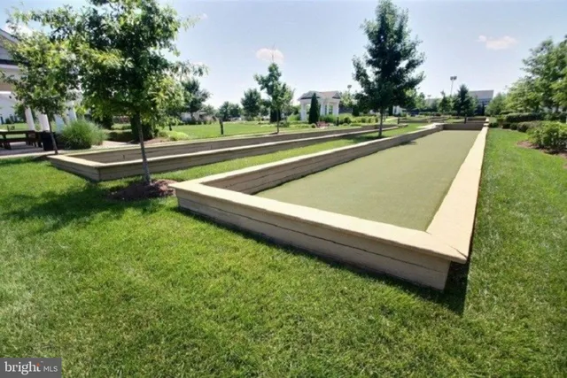 a view of an outdoor space and tennis court