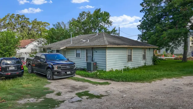 a car parked in front of a house