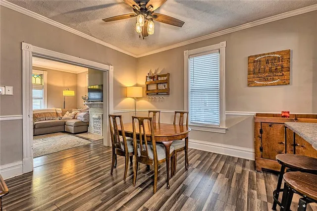 a view of a livingroom with furniture and wooden floor