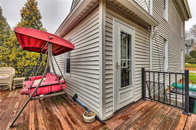 a balcony with view of outdoor space