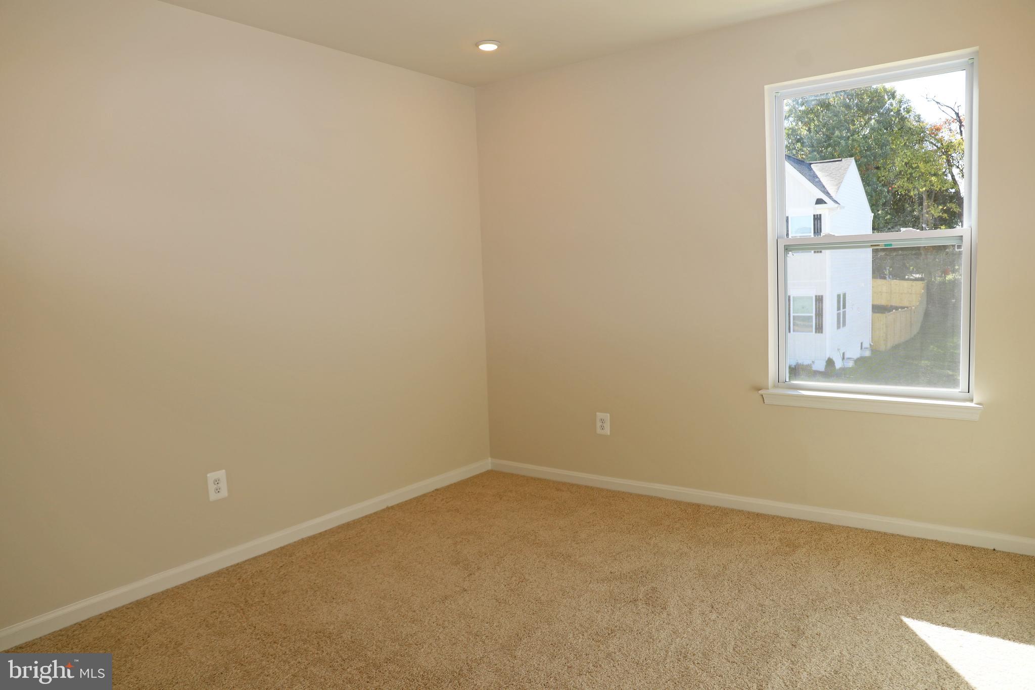 263 Ellery Street Ranson, WV 25438 - Photo 18 of 38 an empty room with a window