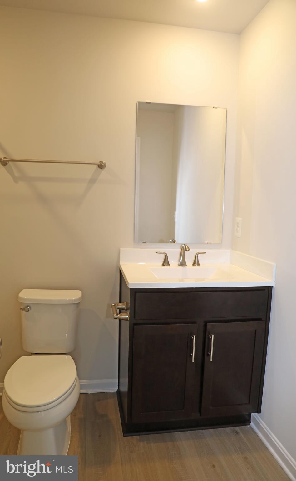 263 Ellery Street Ranson, WV 25438 - Photo 24 of 38 a bathroom with a sink and a toilet