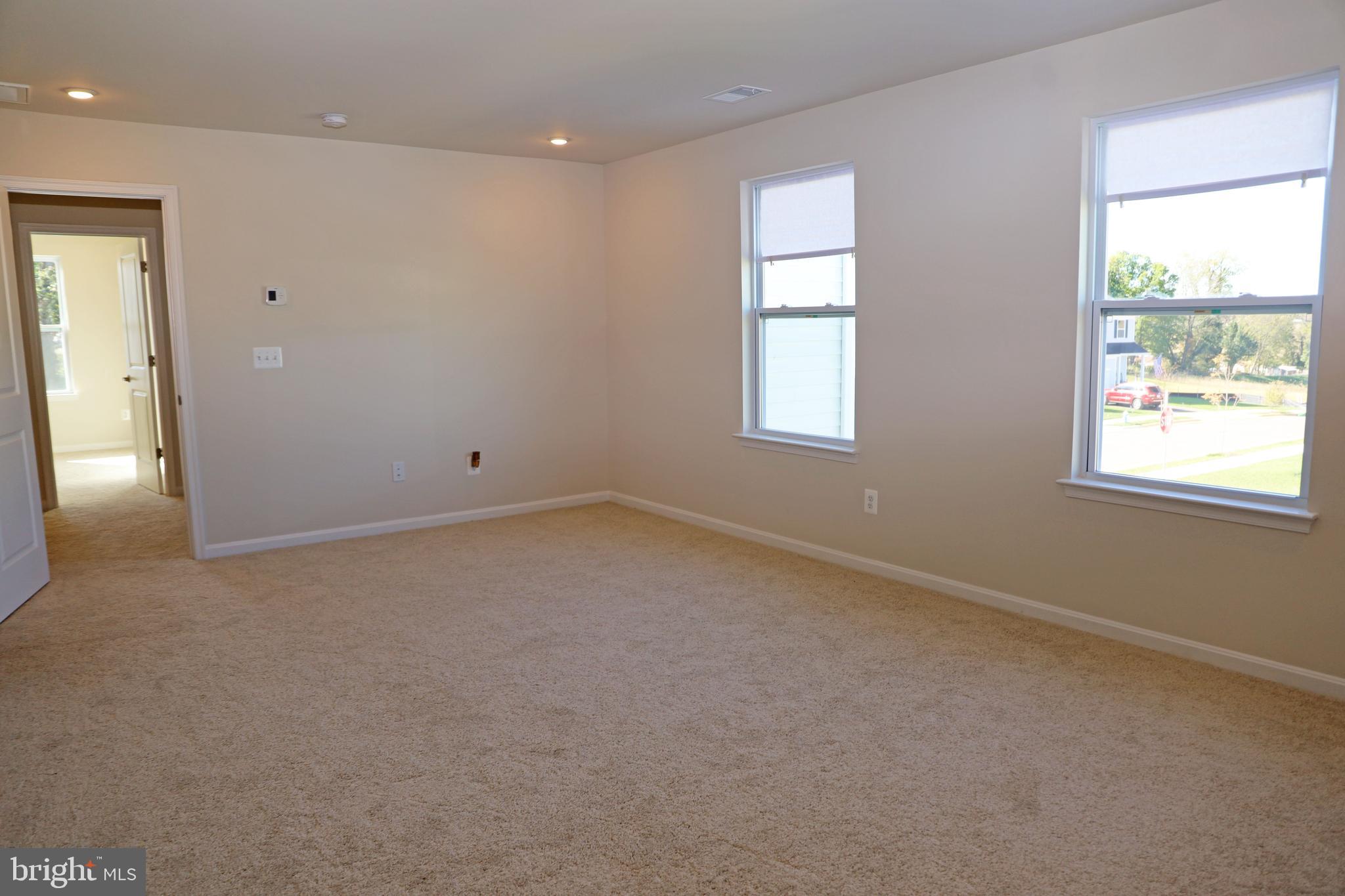 263 Ellery Street Ranson, WV 25438 - Photo 26 of 38 an empty room with windows