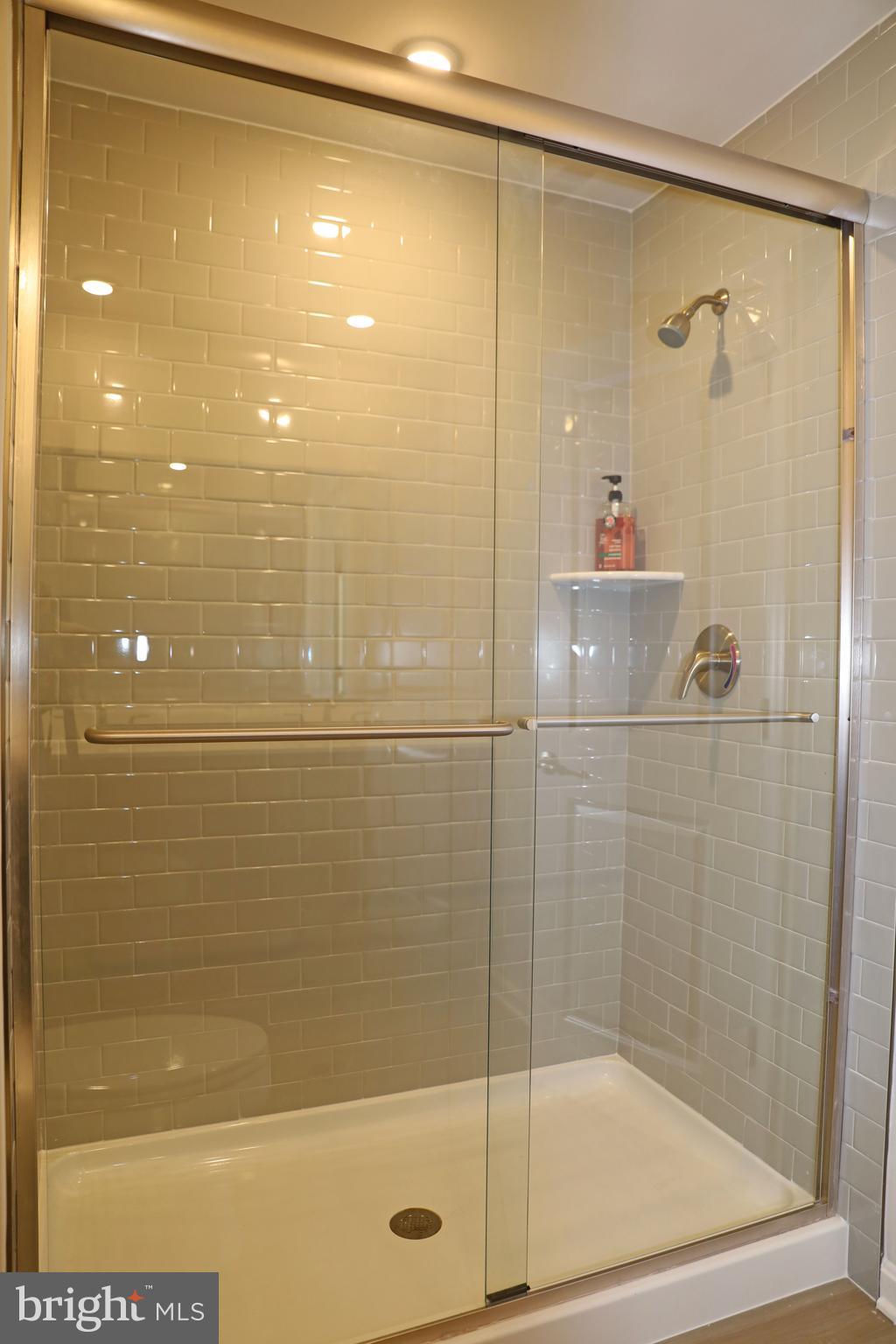 263 Ellery Street Ranson, WV 25438 - Photo 27 of 38 a bathroom with a shower