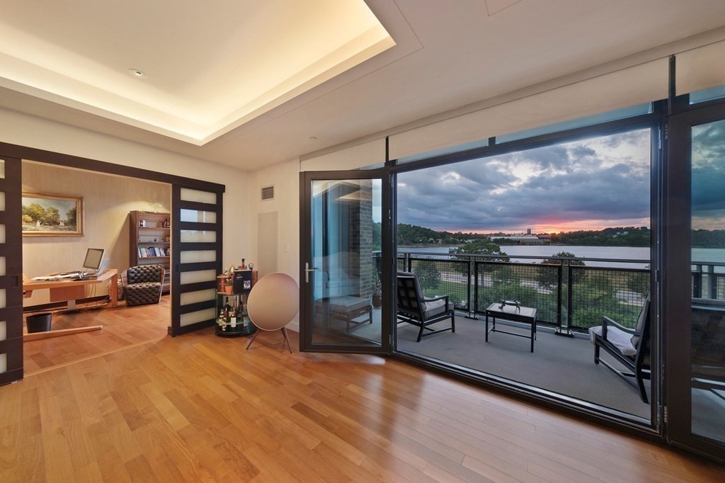 2400 Beacon Street, Unit 401 Boston, MA 02467 - Photo 3 of 35 a view of a livingroom with furniture and front door