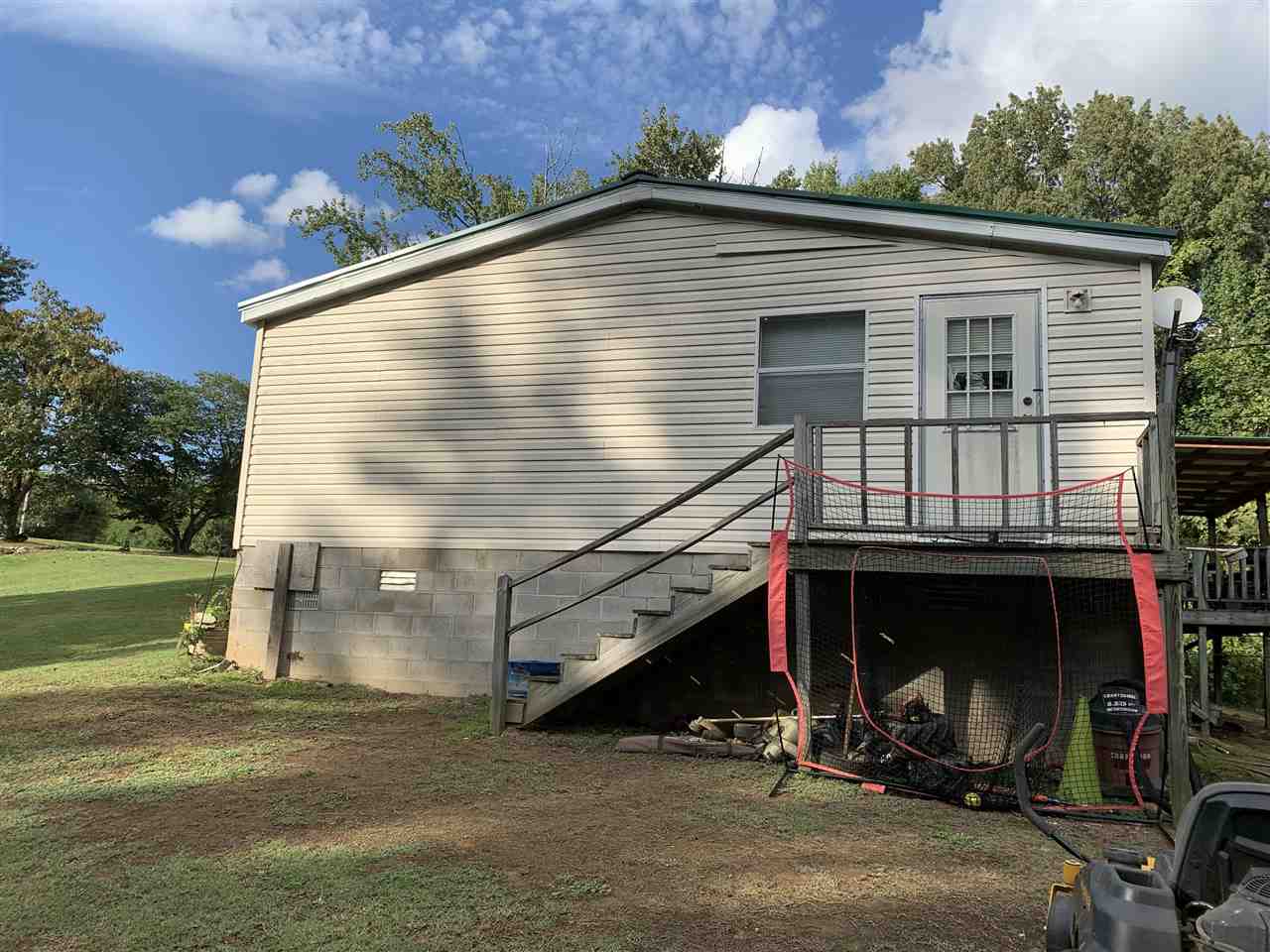 6884 Conner Whitefield Road Ripley, TN 38063 - Photo 10 of 16 a view of a house with a yard