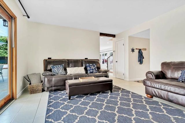 a living room with furniture and a couch