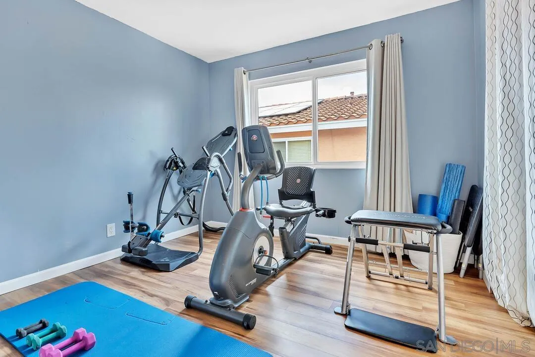 1668 Olmeda Street Encinitas, CA 92024 - Photo 26 of 42 a view of a workspace with furniture and a window
