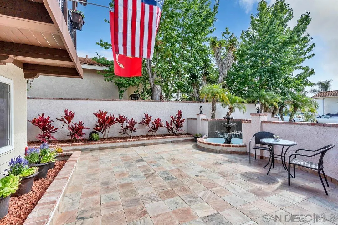 1668 Olmeda Street Encinitas, CA 92024 - Photo 30 of 42 a view of a patio with table and chairs potted plants