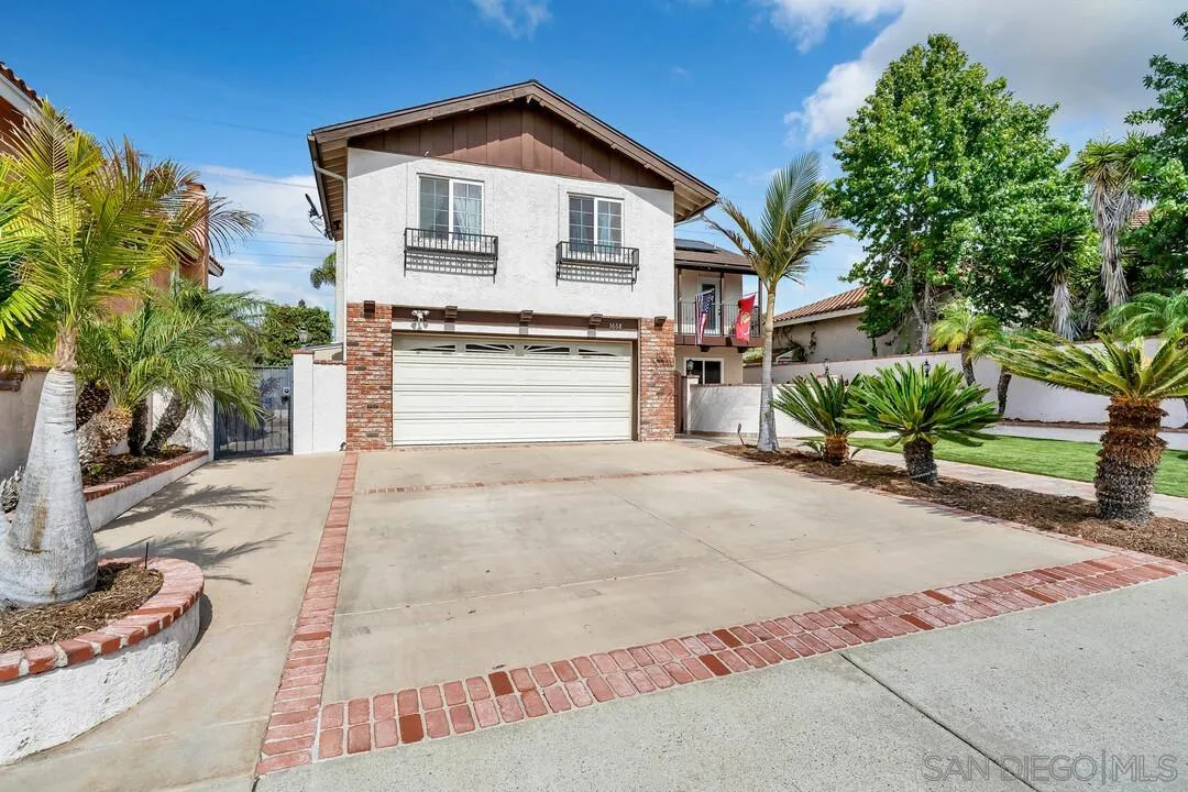 1668 Olmeda Street Encinitas, CA 92024 - Photo 3 of 42 a view of a house with a yard and potted plants