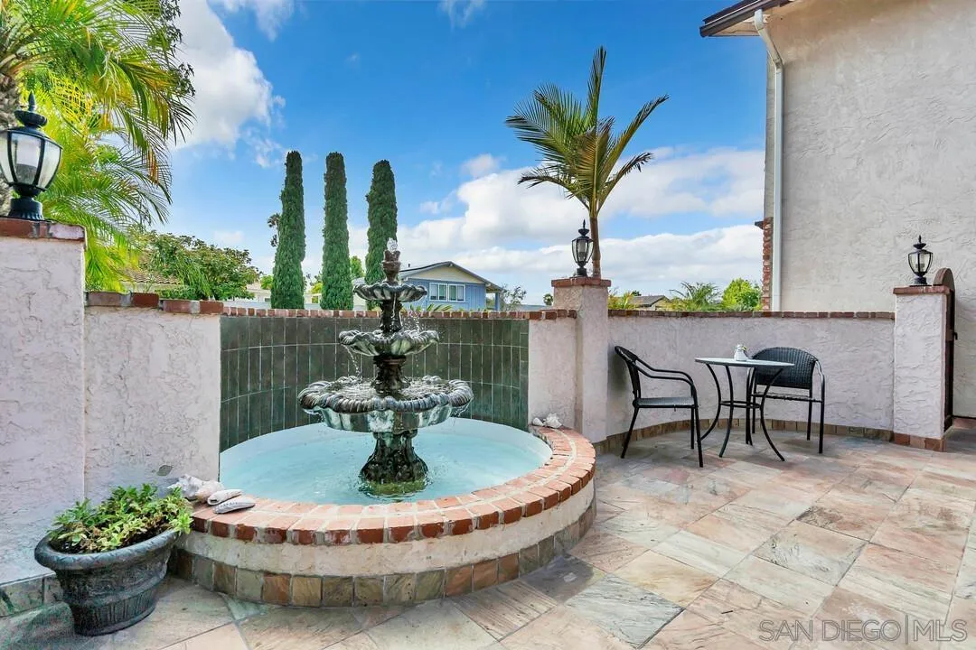 1668 Olmeda Street Encinitas, CA 92024 - Photo 31 of 42 a view of a chairs and table in the patio