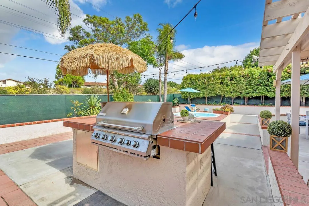 1668 Olmeda Street Encinitas, CA 92024 - Photo 34 of 42 a view of a backyard with sitting area