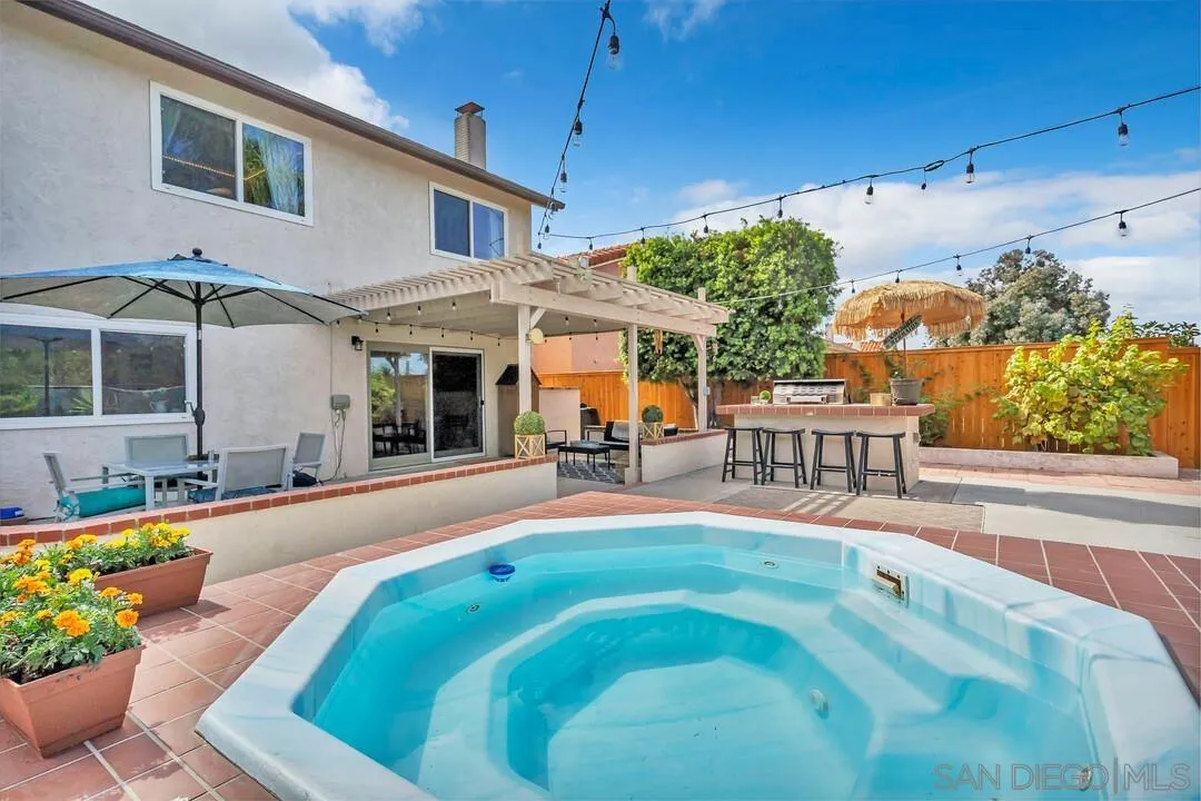 1668 Olmeda Street Encinitas, CA 92024 - Photo 36 of 42 a view of a house with a yard porch and furniture