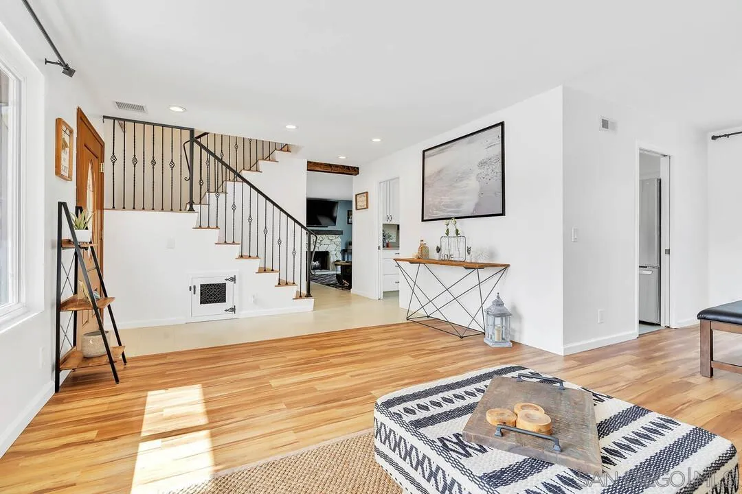 1668 Olmeda Street Encinitas, CA 92024 - Photo 8 of 42 a view of entryway dining room and hall with wooden floor