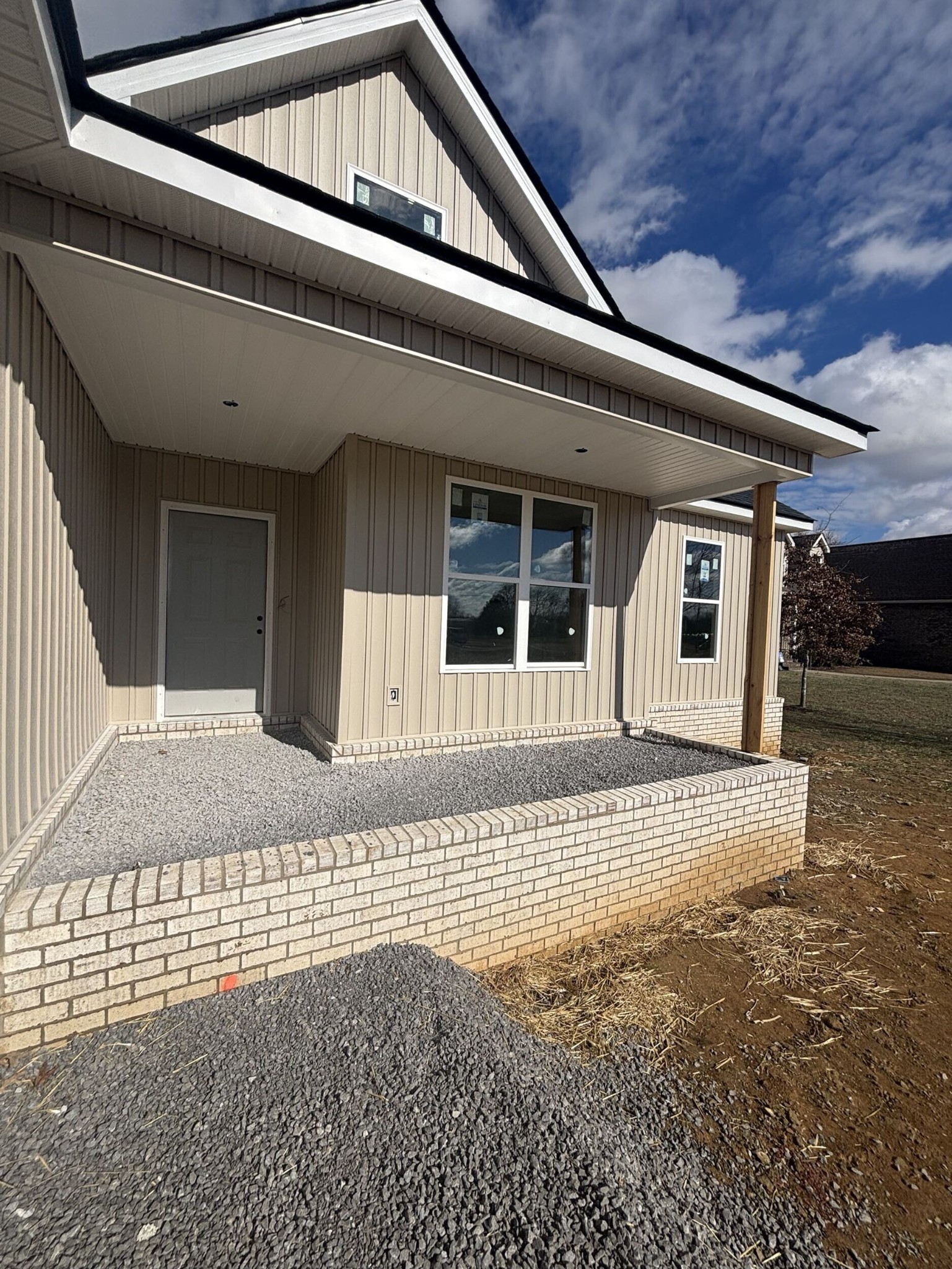 0 Joe Rowlin Road Christiana, TN 37037 - Photo 2 of 11 a front view of a house with a garage